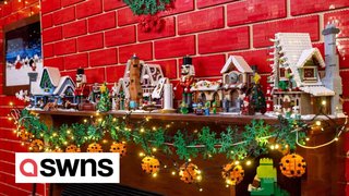 Lego-loving couple build a 12ft Lego Christmas wall complete with fireplace