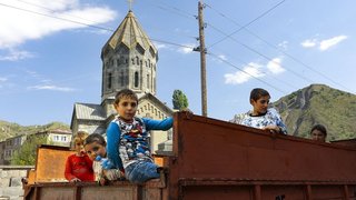 Half of Nagorno-Karabakh's population flees as the separatist government says it will dissolve