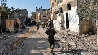 Israeli military says its troops have encircled Gaza City